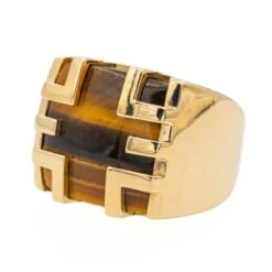 Bague CARTIER, "Yjing",en Or Jaune Et Œil De Tigre 12 Bague CARTIER, "Yjing",en Or Jaune Et Œil De Tigre -Castafiore Boutique bague cartier yjing en or jaune et oeil de tigre 532975