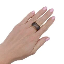 Miller Bague POMELLATO, "Arabesque" En Or Rose Et Titane -Castafiore Boutique bague pomellato arabesque en or rose et titane 996570