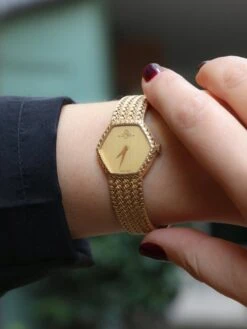 BAUME & MERCIER Montre Vintage Or Jaune Maille Tressée -Castafiore Boutique baume mercier montre vintage or jaune maille tressee 205244