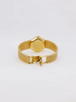 BAUME & MERCIER Montre Vintage Or Jaune Maille Tressée -Castafiore Boutique baume mercier montre vintage or jaune maille tressee 476481