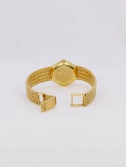 BAUME & MERCIER Montre Vintage Or Jaune Maille Tressée -Castafiore Boutique baume mercier montre vintage or jaune maille tressee 569679