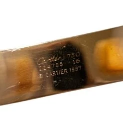 Bracelet CARTIER "Double C Trinity" Trois Ors 6 Bracelet CARTIER "Double C Trinity" Trois Ors -Castafiore Boutique bracelet cartier double c trinity trois ors 600635