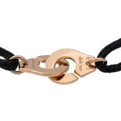 Bracelet DINH VAN "Menottes R12" En Or Rose Sur Cordon -Castafiore Boutique bracelet dinh van menottes r12 en or rose sur cordon 360661
