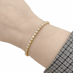 Miller Bracelet Ligne CARTIER En Or Jaune Et Diamants. 6 Miller Bracelet Ligne CARTIER En Or Jaune Et Diamants. -Castafiore Boutique bracelet ligne cartier en or jaune et diamants 281116