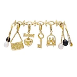Miller Bracelet Louis Vuitton, "Idylle",breloques, Or Jaune, Or Blanc, Perles. 9 Miller Bracelet Louis Vuitton, "Idylle",breloques, Or Jaune, Or Blanc, Perles. -Castafiore Boutique bracelet louis vuitton idylle breloques or jaune or blanc perles 537964