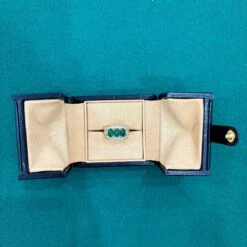 Bague BULGARI "Trombino' émeraude Et Diamants -Castafiore Boutique bulgari emerald diamond trombino gold ring ca 1970s 223811