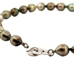 Collier DINH VAN "Menottes R15" En Or Blanc Et Perles De Tahiti 7 Collier DINH VAN "Menottes R15" En Or Blanc Et Perles De Tahiti -Castafiore Boutique collier ras de cou dinh van menottes r15 en or blanc et perles de tahiti 770281