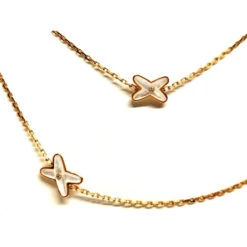 Collier Sautoir CHAUMET "Jeux De Liens" En Or Rose, Nacre Et Diamants -Castafiore Boutique collier sautoir chaumet jeux de liens en or rose nacre et diamants 522138