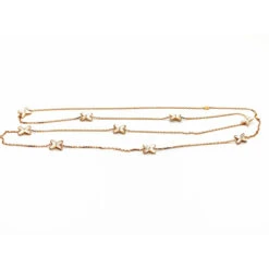 Collier Sautoir CHAUMET "Jeux De Liens" En Or Rose, Nacre Et Diamants -Castafiore Boutique collier sautoir chaumet jeux de liens en or rose nacre et diamants 731064