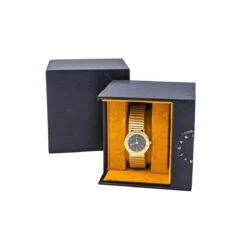 Montre BULGARI "Tubogas" En Or Jaune, Quartz Et Saphir -Castafiore Boutique montre bulgari tubogas en or jaune quartz et saphir 7736372